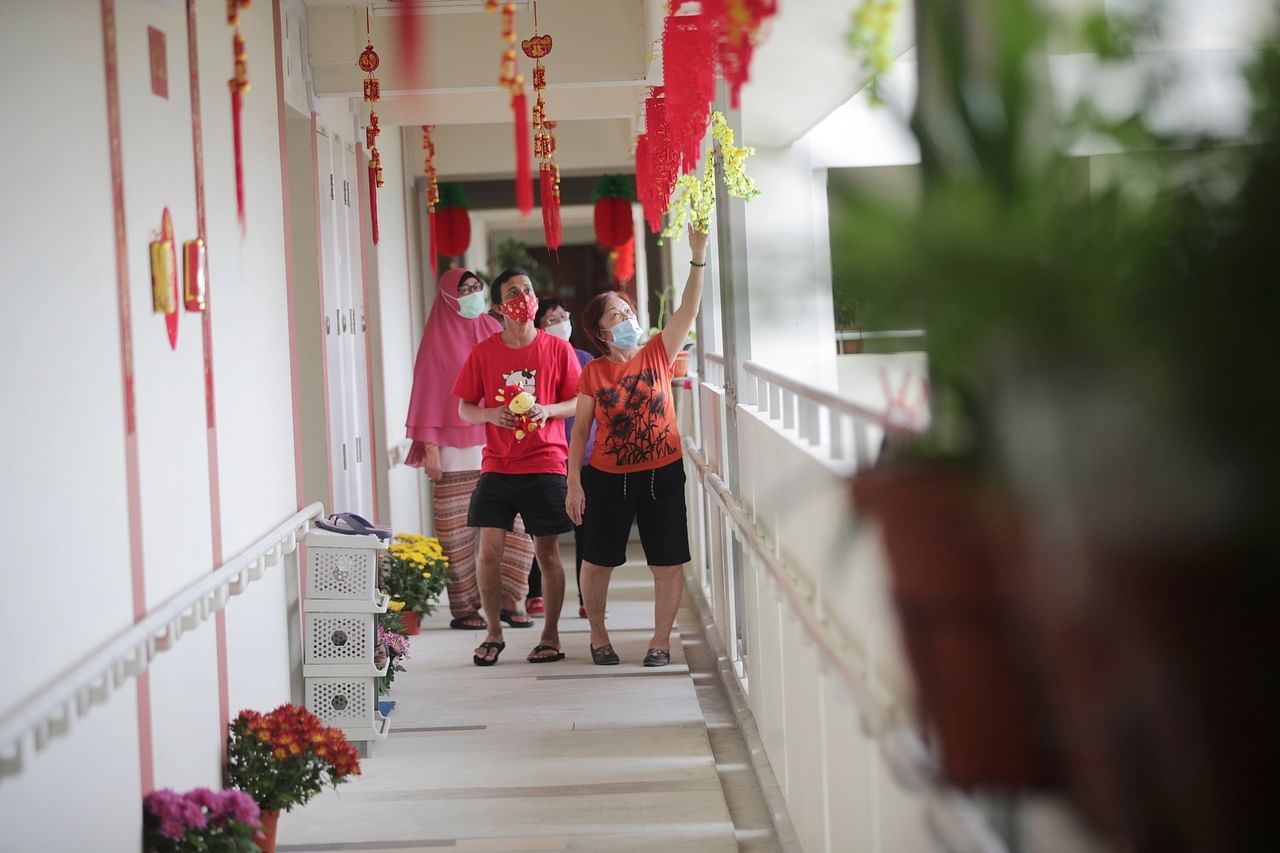 Reliving the kampung spirit': Neighbours put up CNY decorations