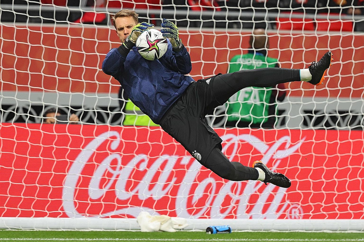German goalkeeper Manuel Neuer warming up before Bayern's win over Egypt's Al-Ahly in Monday's Club World Cup semi-finals. They meet Mexican team Tigres in today's final.