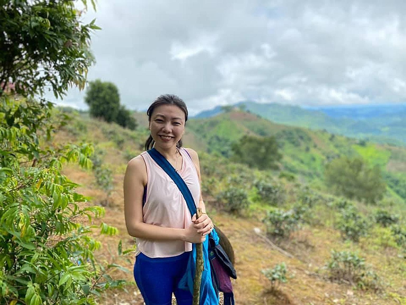 Above: Ms Wang Lijun, a director at a consumer goods firm, has lived in Myanmar since 2012. Left: Digital marketer Joyann Lim, seen here with supporters of Ms Aung San Suu Kyi, says her bosses are thinking of asking people to go on leave.