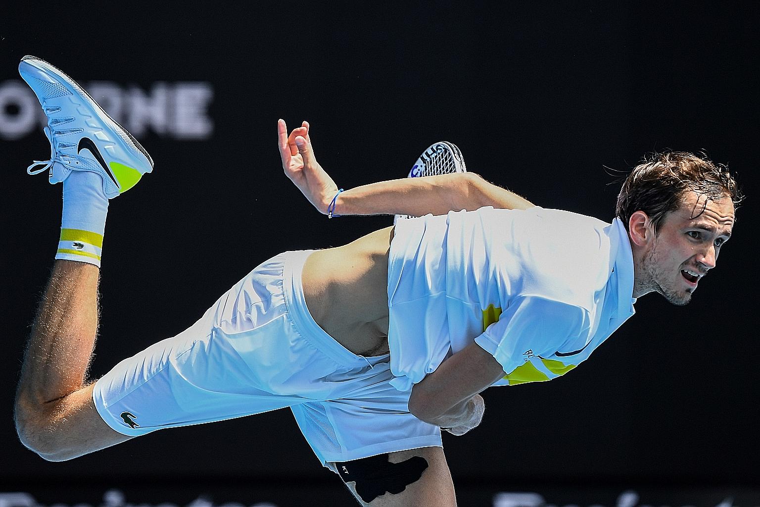 Daniil Medvedev on his way to beating Serbia's Filip Krajinovic 6-3, 6-3, 4-6, 3-6, 6-0 in Melbourne yesterday. He had never won a five-set match in six previous attempts. PHOTO: AGENCE FRANCE-PRESSE