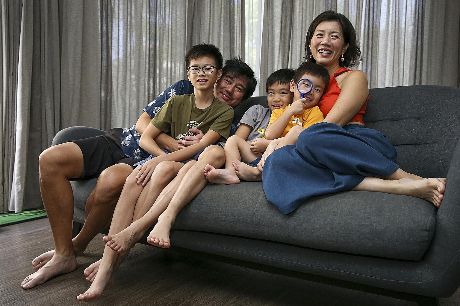 Mrs Cherie Tseng and her husband Tseng Wun Hsiung, with their sons (from left) Quentin, 11, Evan, nine, and Oliver, three. The couple sprang into action to help migrant workers last April after learning that the workers were not allowed to leave thei
