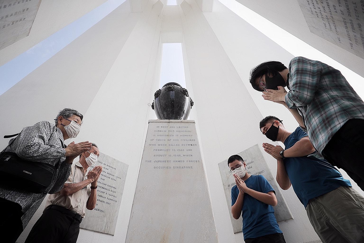 Madam Shen Pin Pin, 82, her husband Ang Eng Chong, 88, their daughter Ang Shen, 54, Ms Ang's nephew Leo Yug Chuen, 13, and Yug Chuen's father Leo Kum Chew, 48, paying their respects to Madam Shen's father after the 54th War Memorial Service at War Me