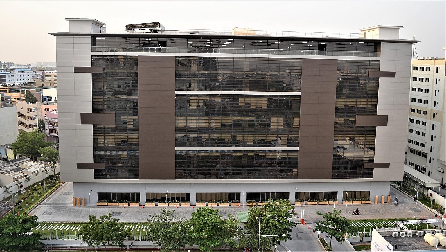 Ascendas India Trust has entered into definitive agreements to acquire the fully operational and tenanted aVance 6 office building (above) in Hitec City, Hyderabad, India.