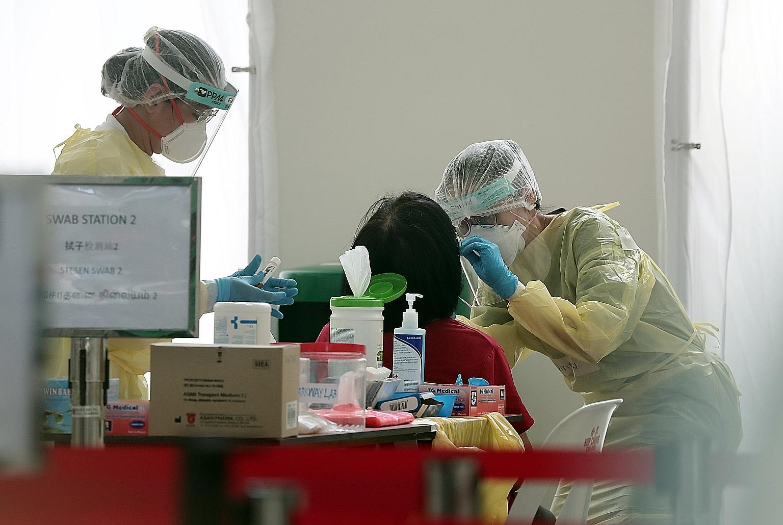 The salary increase will apply across all public healthcare institutions as well as publicly-funded long-term care service providers. Support care staff, too, will get more take-home pay. ST PHOTO: KELVIN CHNG