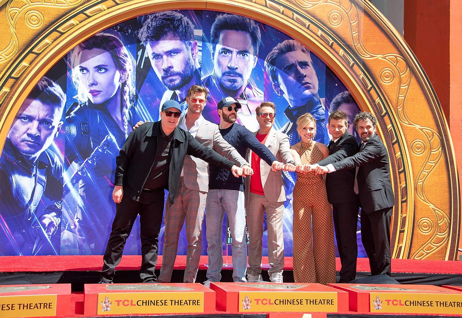 (From far left) President of Marvel Studios Kevin Feige and stars of the Avengers films - actors Chris Hemsworth, Chris Evans, Robert Downey Jr, Scarlett Johansson, Jeremy Renner and Mark Ruffalo - at the TCL Chinese Theatre in Hollywood, California,
