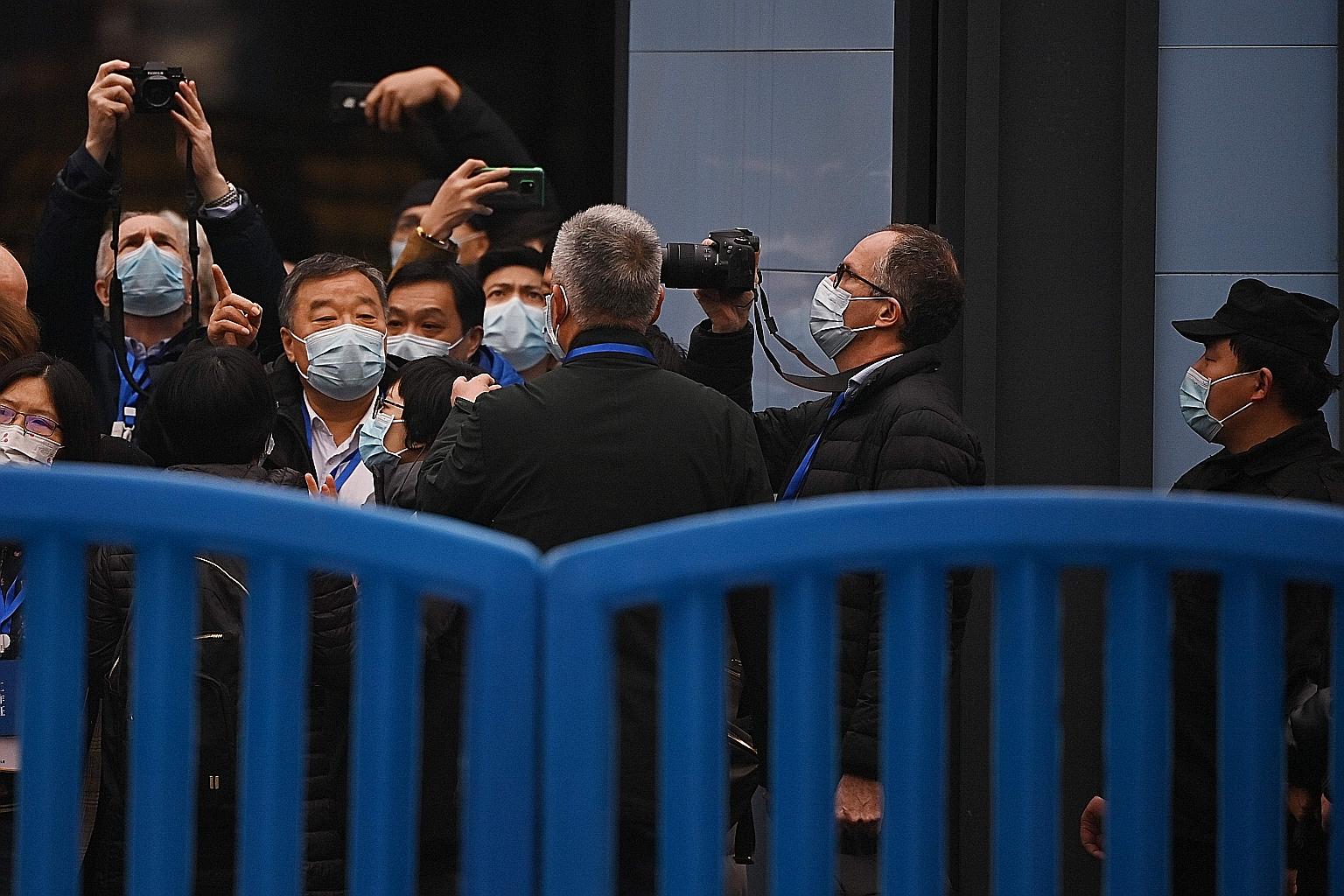 Dr Peter Ben Embarek (second from right) and other members of the World Health Organisation team investigating the origins of the Covid-19 virus, visiting Wuhan's Huanan seafood market on Jan 31.