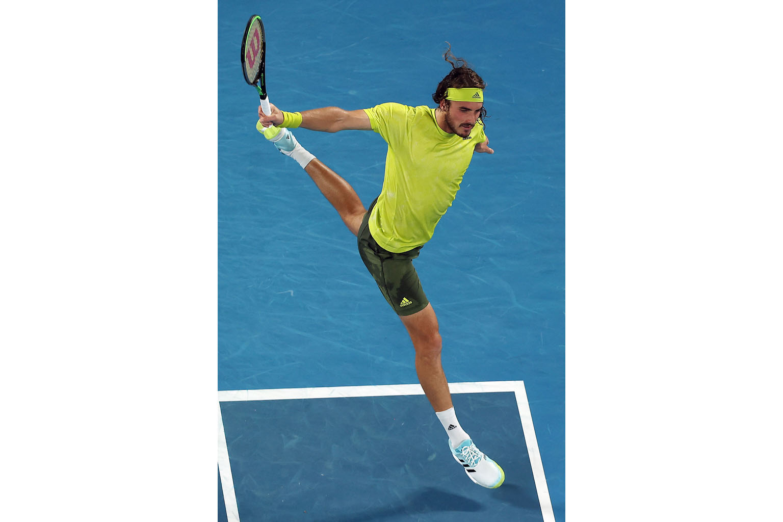 Greece's Stefanos Tsitsipas hitting a return against Spain's Rafael Nadal in their quarter-final clash yesterday. He won in five sets and will face Russia's Daniil Medvedev for a place in Sunday's final.