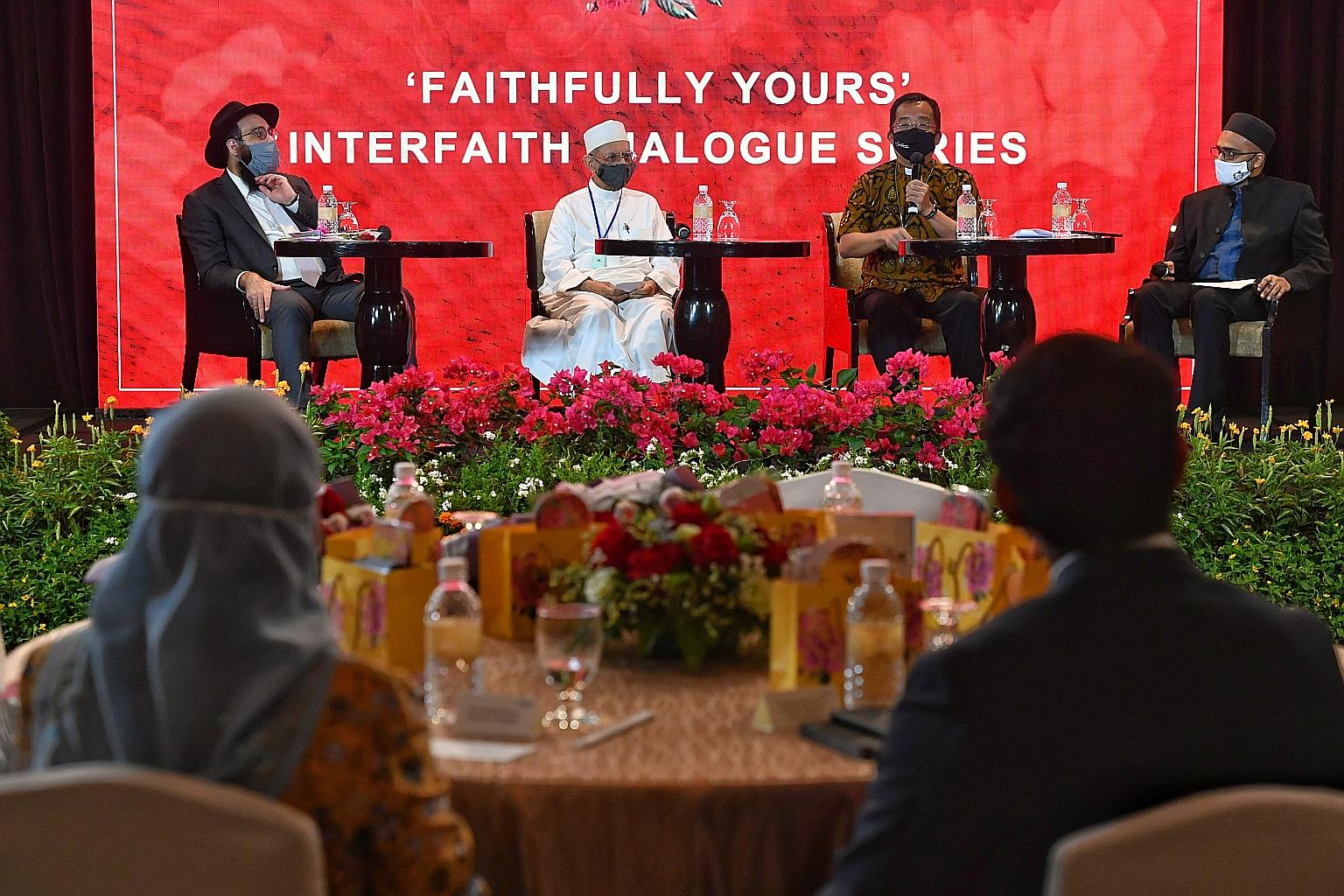 (From left) Chief Rabbi of Singapore Mordechai Abergel, Habib Hassan Al-Attas of Ba'alwi Mosque and Bishop Terry Kee in a dialogue after the appointment of the peace ambassadors by President Halimah Yacob (in audience) yesterday. Mr Idris Kamal of Ro