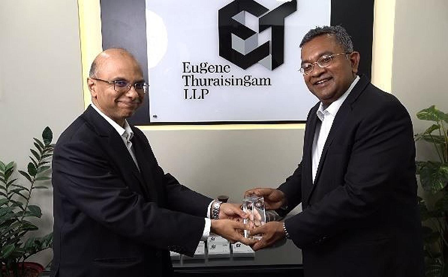 Mr Eugene Thuraisingam (at right) receiving the Pro Bono Ambassador Award 2020 from Law Society president Gregory Vijayendran last month. The annual award is given by the Council of the Law Society to an individual for his established track record of