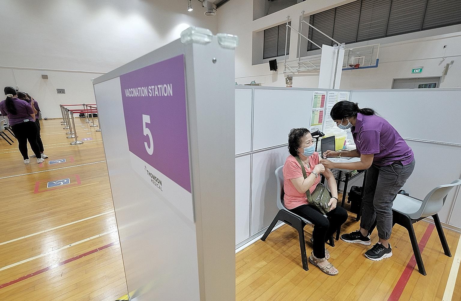 A Covid-19 vaccination drive under way at Senja-Cashew Community Club on Monday. The question that vaccine doubters must ask themselves is not what the risks are in receiving the jab, but what risks they face by not getting vaccinated once Covid-19 m