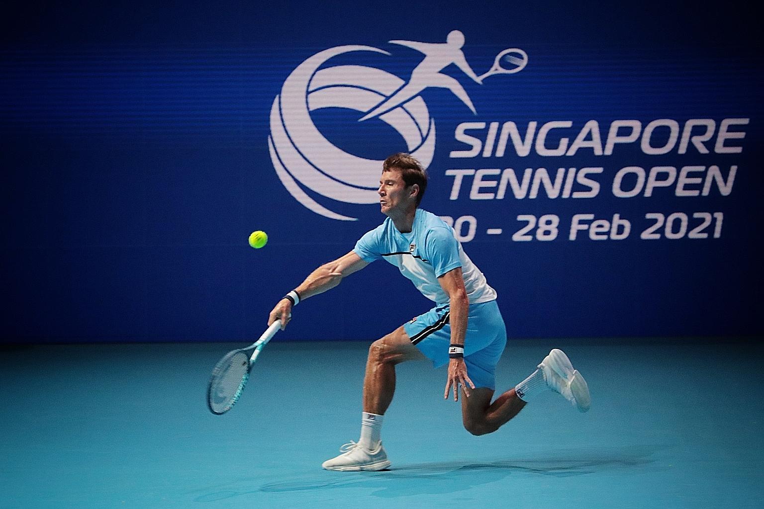 Matthew Ebden stretching for a return against fellow Australian John Millman in their round-of-16 match at the OCBC Arena yesterday. Things are looking up for the veteran, whose ranking dropped nearly 300 spots in a little over two years due to injur