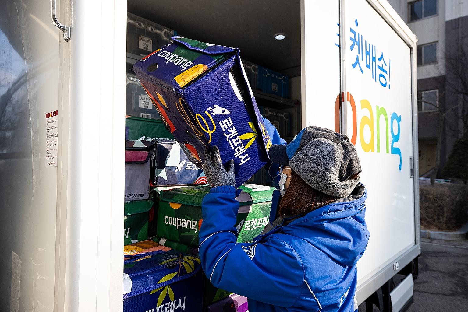 A Coupang employee unloading fresh food from a truck in Bucheon, South Korea. Founded in 2010, Coupang is a major e-commerce and on-demand food delivery player in the country. A listing on the New York Stock Exchange could spell gains for SPH and the