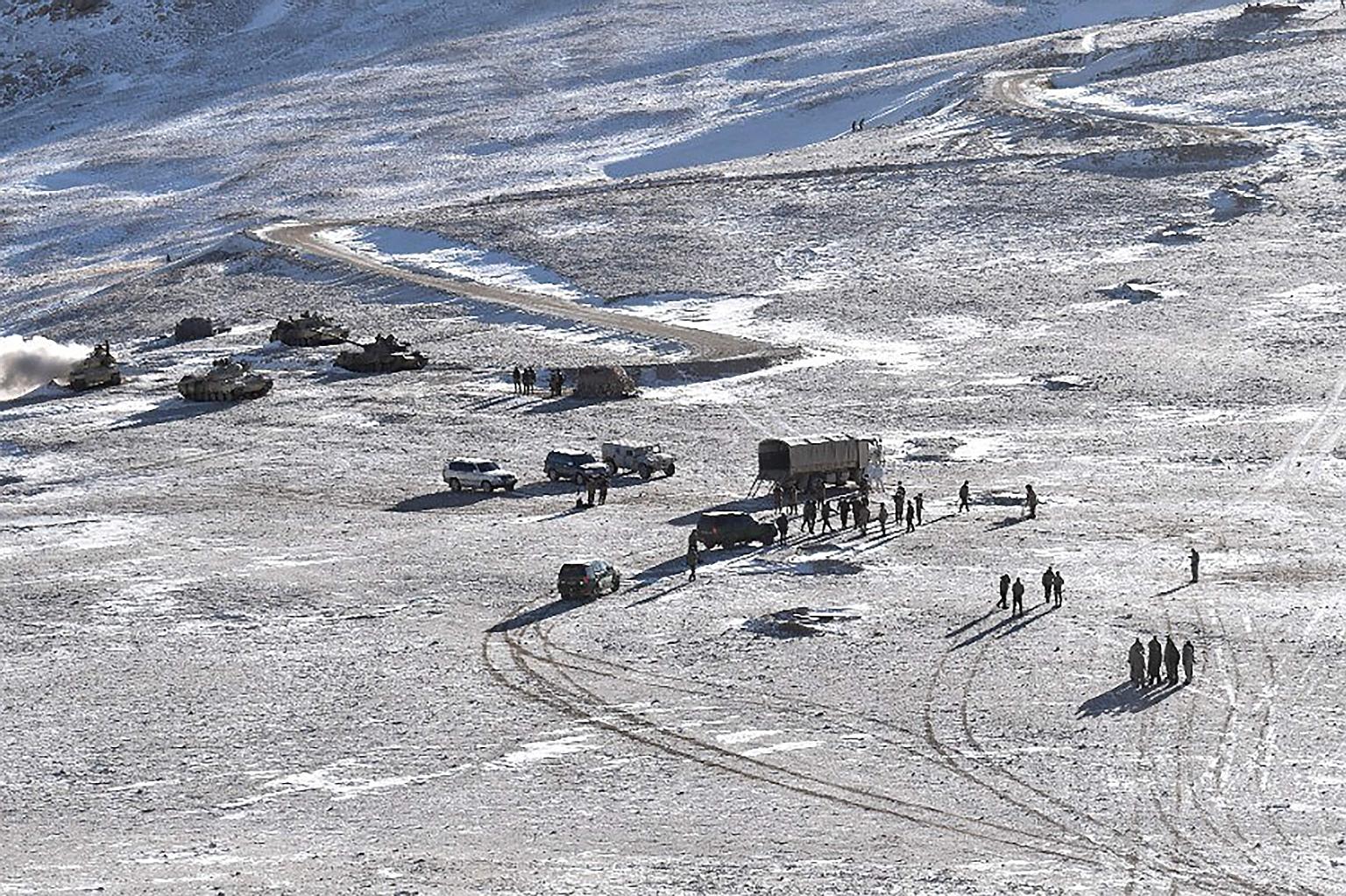 This undated handout picture, released by the Indian Army on Feb 16, shows Chinese soldiers and tanks during military disengagement along the Line of Actual Control (LAC) in Ladakh. The LAC is a notional demarcation line separating Indian-controlled 