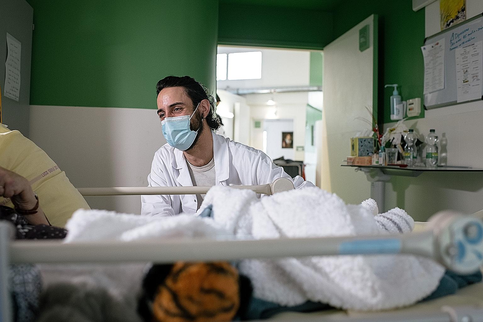 Actor Hugo Jasienski reading a poem to an elderly patient at the Charles-Foix hospital in Ivry-sur-Seine in Paris last week.