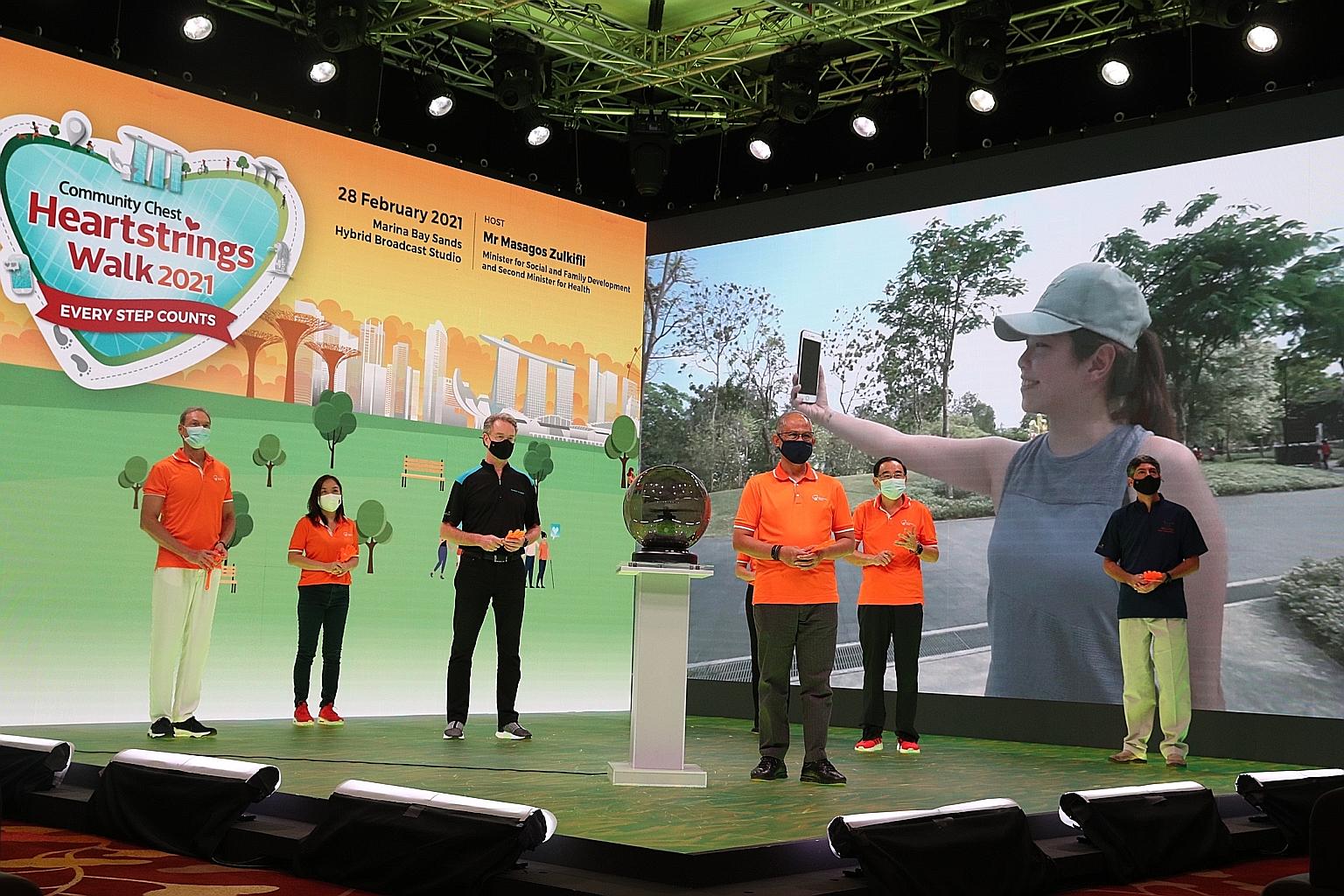 Minister for Social and Family Development and Second Minister for Health Masagos Zulkifli (fourth from left) at the launch of the Community Chest (ComChest) Heartstrings Walk 2021 yesterday. With him are (from left) event committee co-chair Andrew d