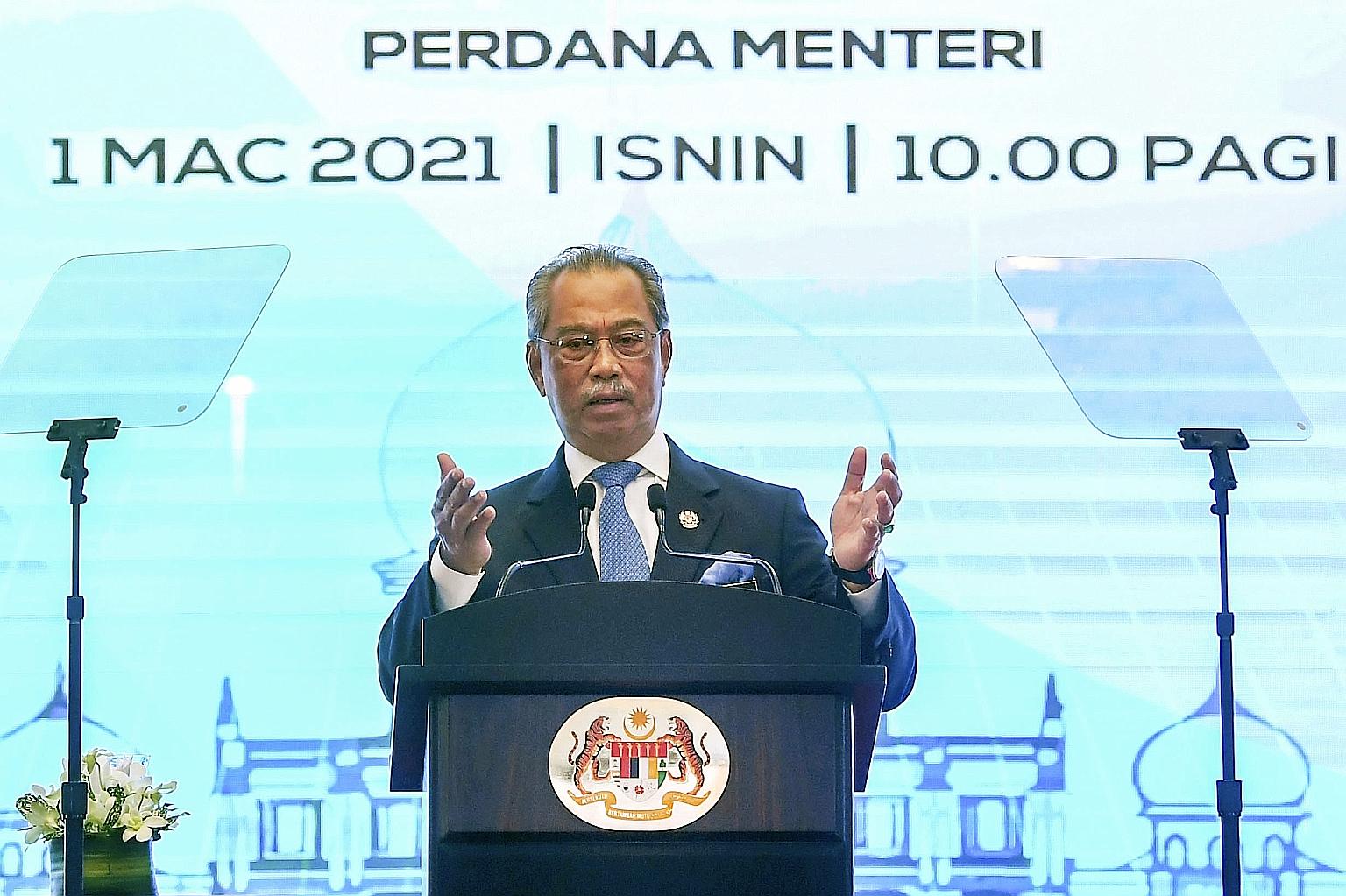 Malaysian Prime Minister Muhyiddin Yassin making a speech yesterday that marked the first anniversary of his government.