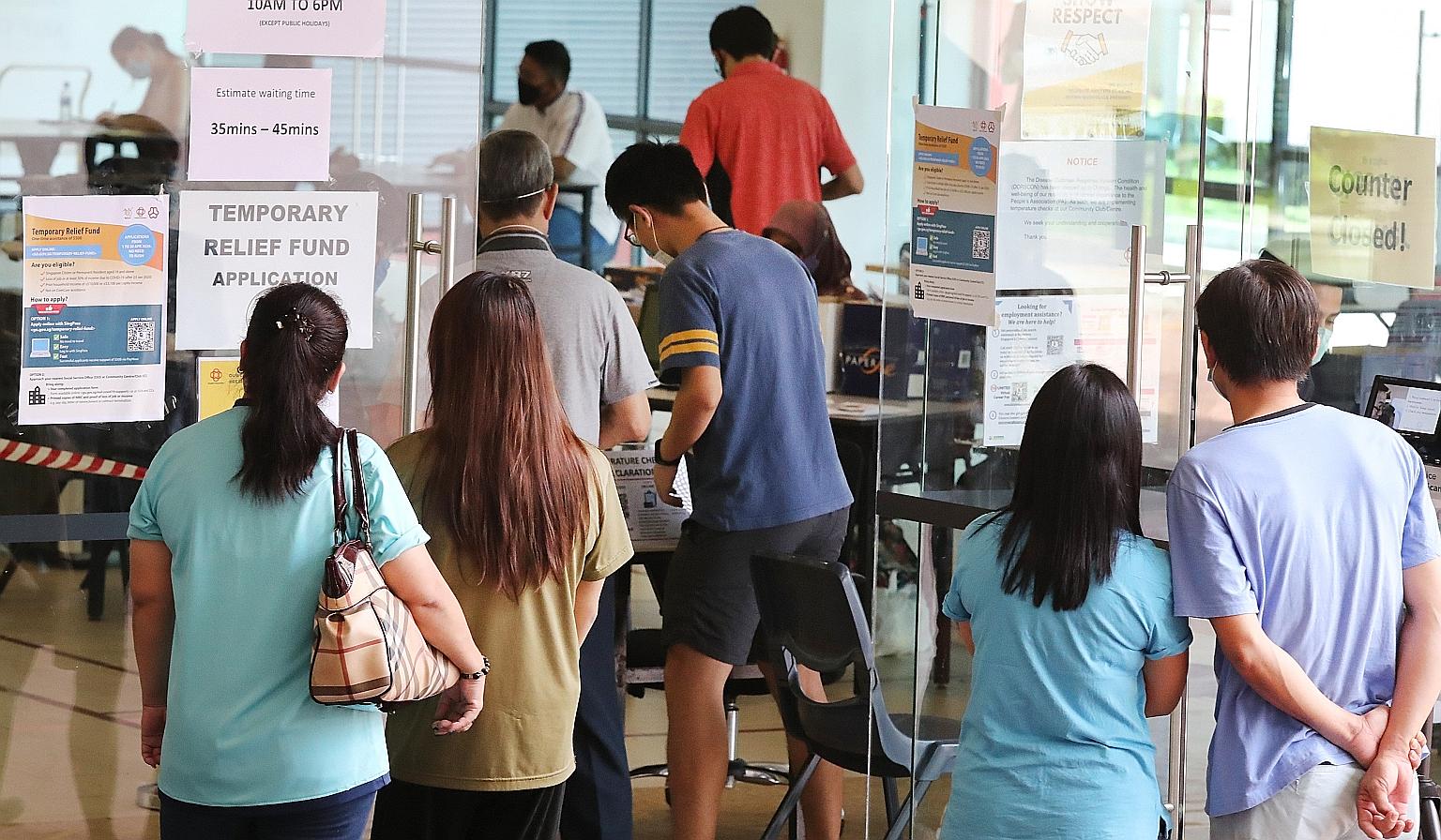 People applying for the Temporary Relief Fund last April. The latest NAV Financial Health Series report released yesterday found that the lower-income group was the worst hit - accounting for about 49 per cent of customers who experienced income loss