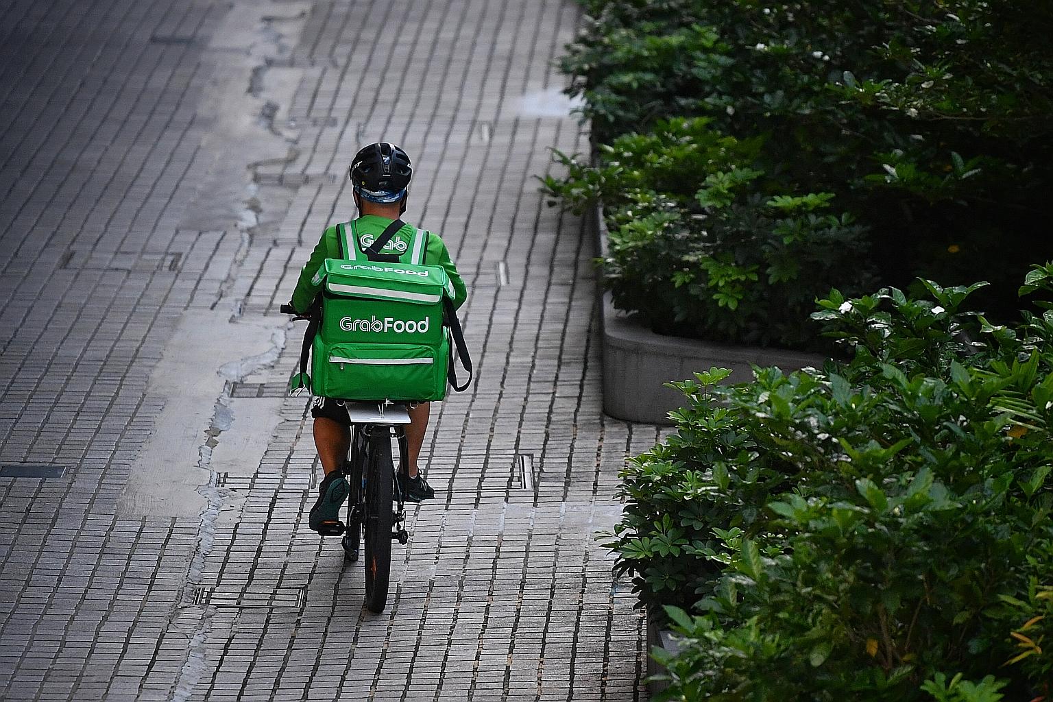 The Ministry of Manpower will look into how to find a better balance in the arrangements between gig workers such as food delivery riders and the platforms that deploy their services, said Manpower Minister Josephine Teo yesterday.