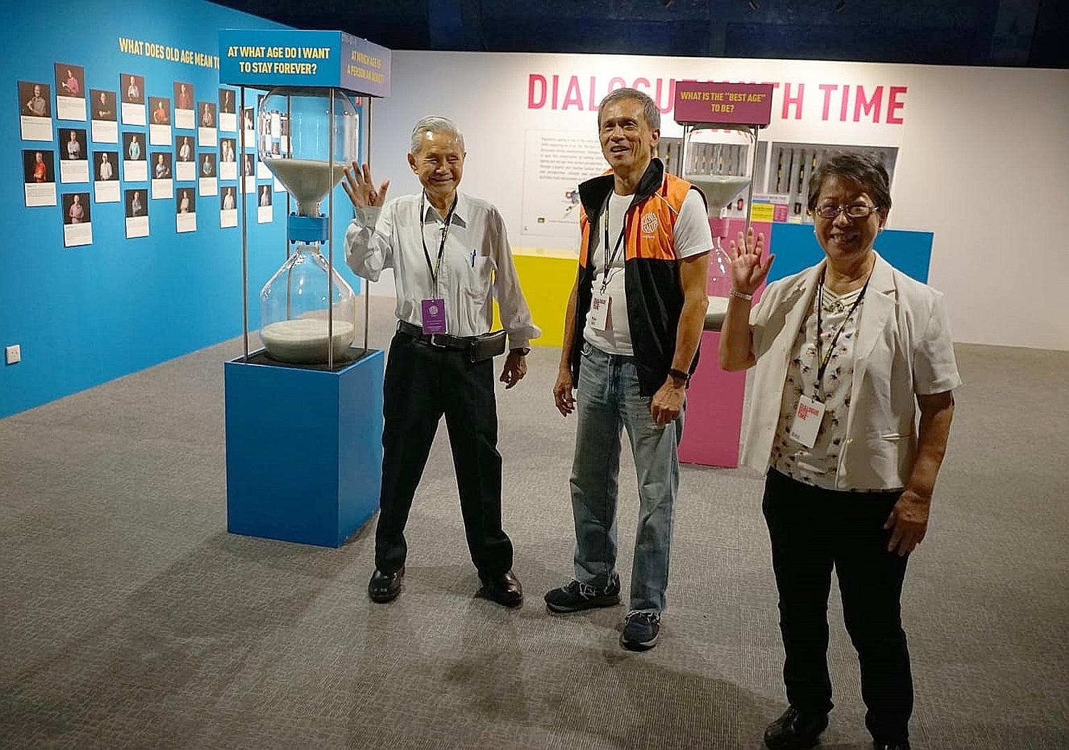 Mr Mike Goh (centre) with fellow senior guides at the Dialogue With Time - Embracing Ageing exhibition at the Science Centre Singapore.