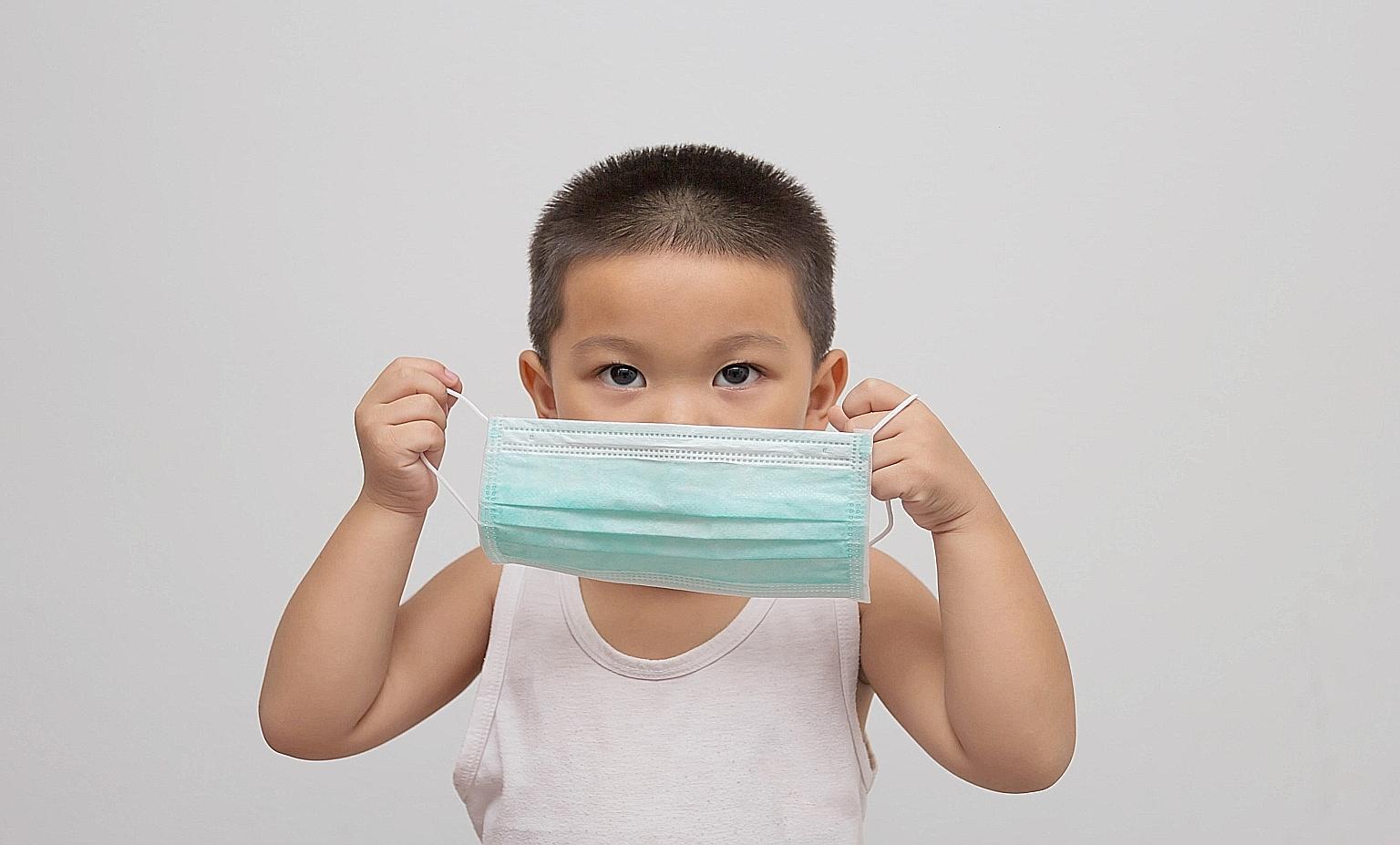 A challenge for young children during the pandemic is learning to read people's facial expressions with faces half-covered by masks.