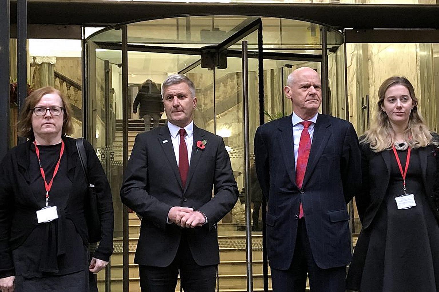 Richard Freeman (second from left) and his defence team after appearing at the misconduct hearing.