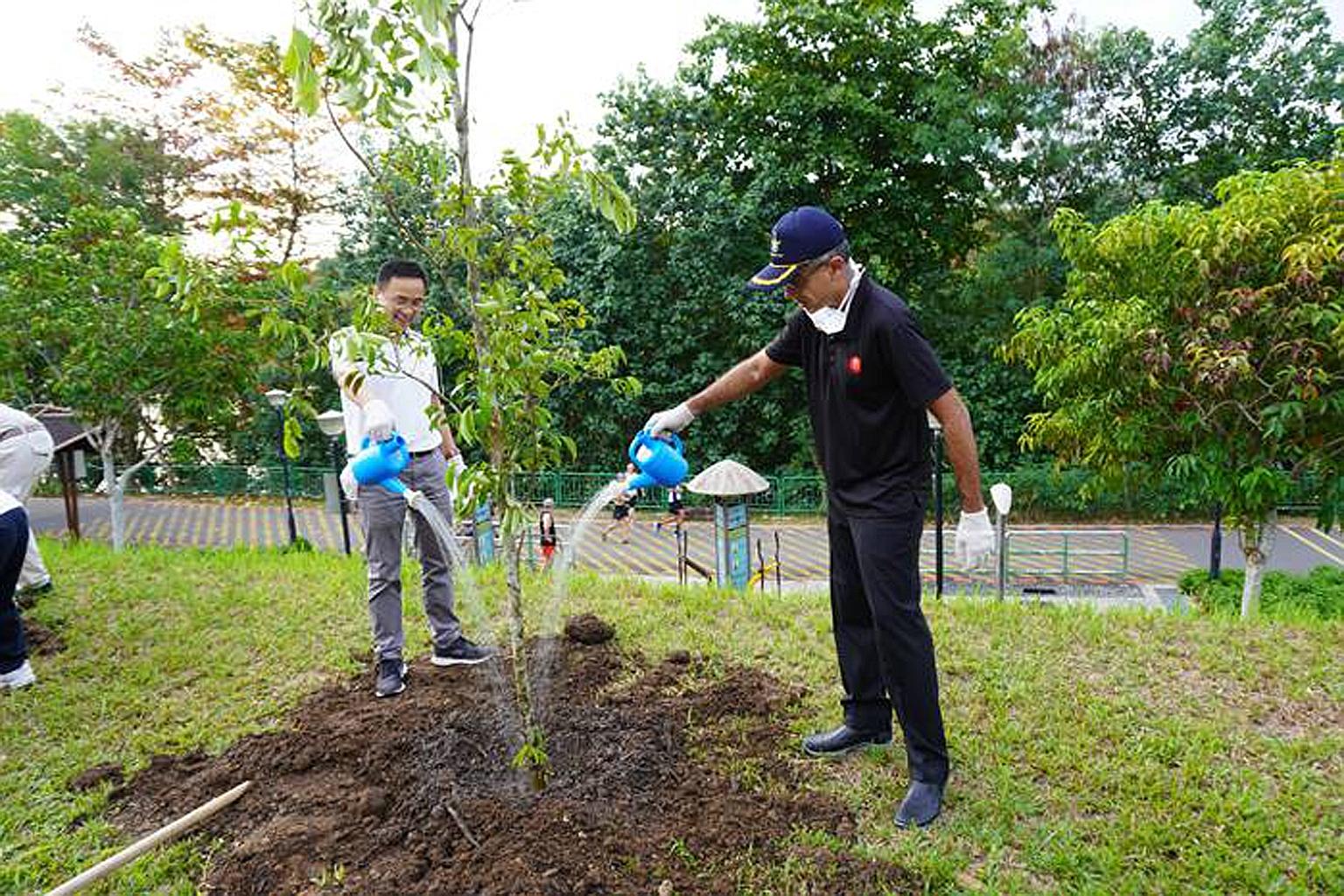 Pioneer staff of Farrer Park Hospital and specialists from Farrer Park Medical Centre were among the volunteers who helped to plant the trees. PHOTO: FARRER PARK HOSPITAL