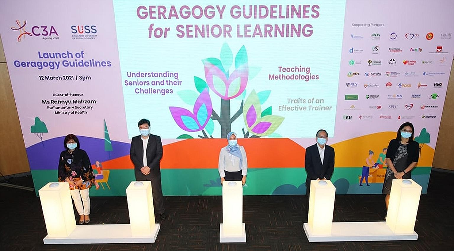 Parliamentary Secretary for Health Rahayu Mahzam (centre) at yesterday's launch of the geragogy guidelines developed by the Council for Third Age (C3A) and Singapore University of Social Sciences (SUSS), along with (from left) C3A chief executive Soh