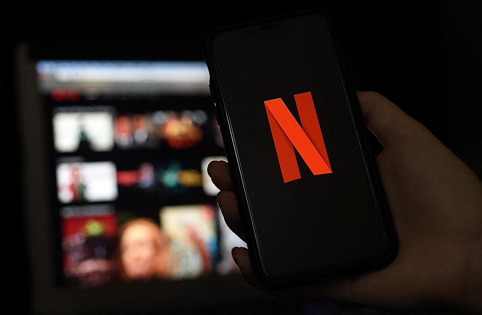 Some Netflix users are receiving a message asking them to confirm that they live with the account owner by entering details from a text message or e-mail sent to the owner. PHOTO: AGENCE FRANCE-PRESSE