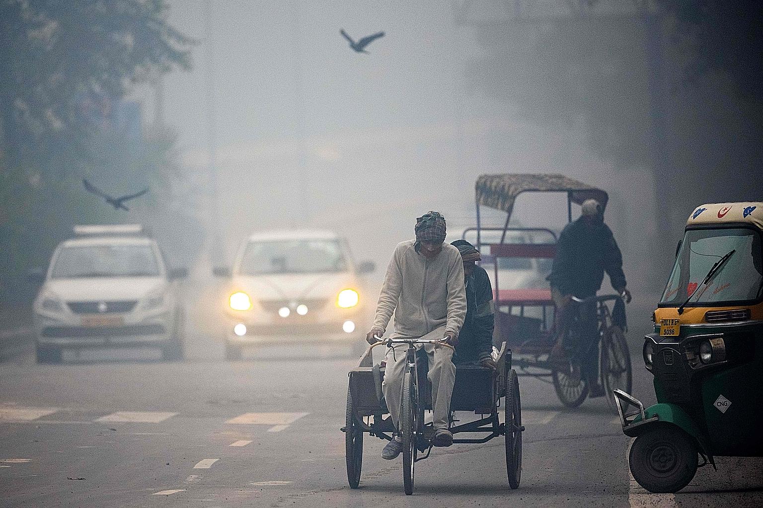 Heavy smog conditions in New Delhi in January. India, the world's third-biggest emitter, has come under pressure to make a net-zero pledge ahead of global climate talks in Glasgow, Scotland, this year. PHOTO: AGENCE FRANCE-PRESSE
