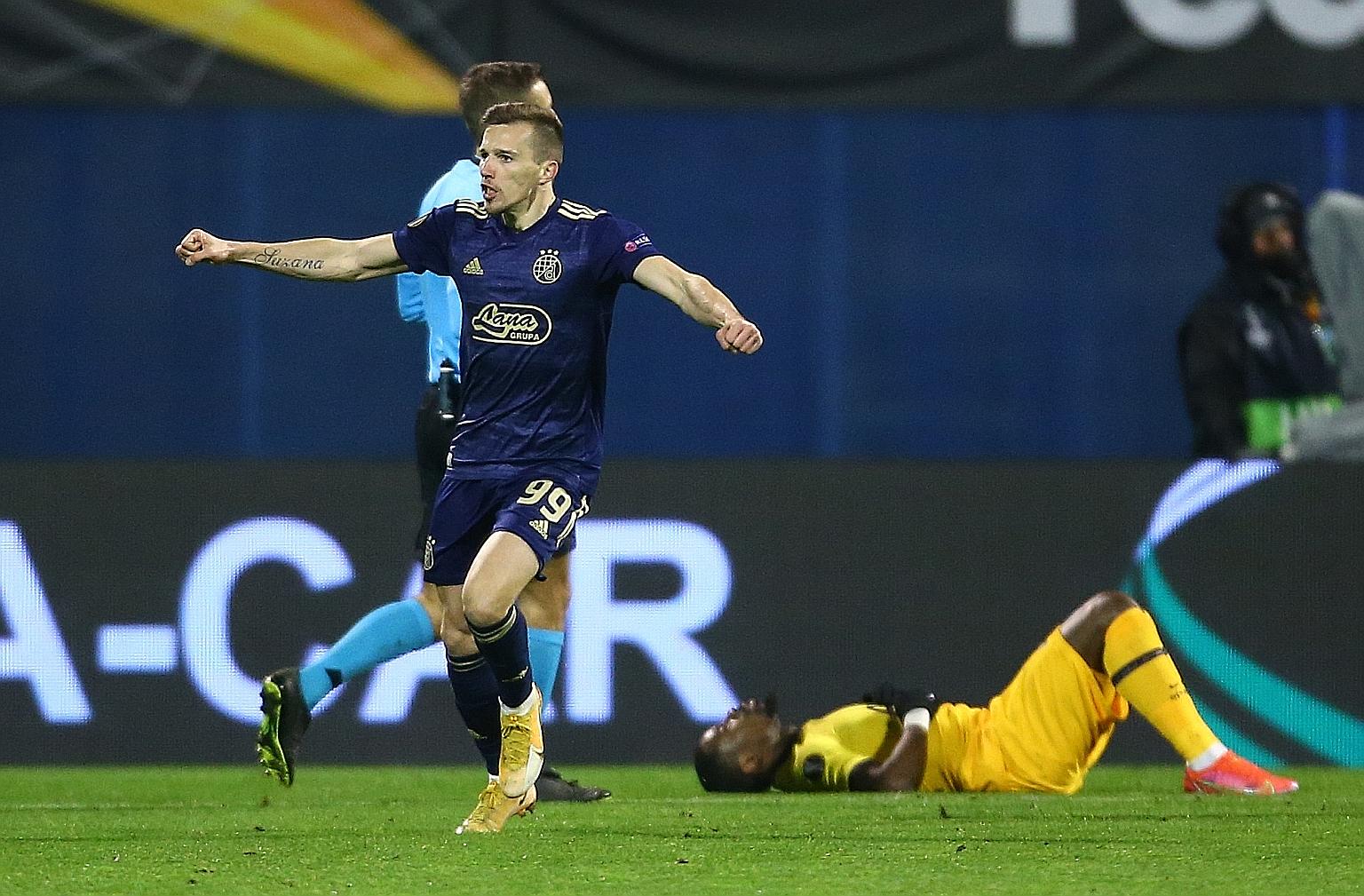 Dinamo Zagreb's Mislav Orsic celebrates after scoring his first goal against Tottenham Hotspur at Zagreb's Stadion Maksimir on Thursday. While Orsic's hat-trick, completed early in extra time, was world class, Spurs' performance was feeble in the ext