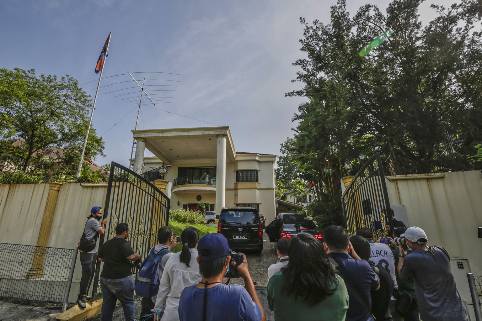 Members of the media gathering outside the main entrance of the North Korean embassy in Kuala Lumpur yesterday. The two countries have severed diplomatic ties after the extradition from Malaysia of a North Korean man to the United States to face mone