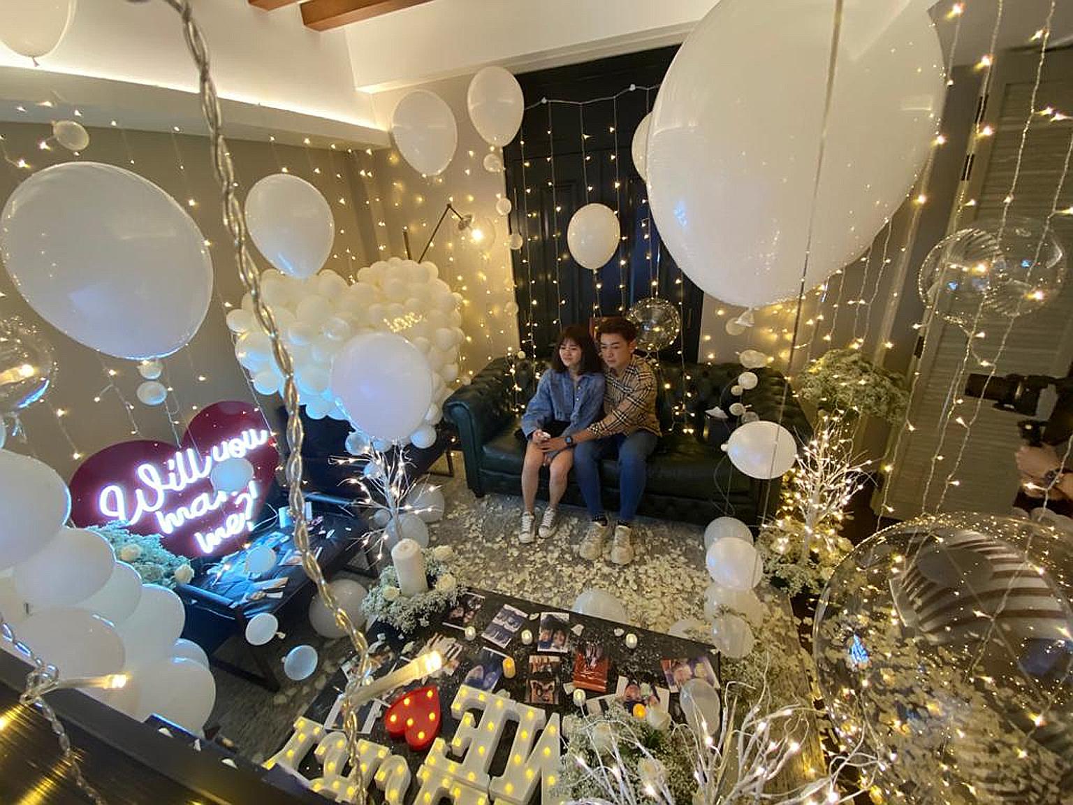 Mr Zakk Toh proposed to his girlfriend, Ms Tee Wei Kian (both left), during a staycation at The Barracks Hotel Sentosa.
