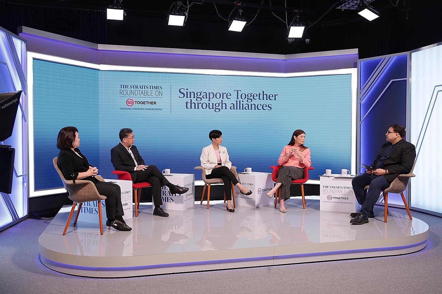 Minister in the Prime Minister's Office Indranee Rajah (centre) with the panellists at yesterday's Singapore Together Through Alliances roundtable: (from left) Dr Gillian Koh, deputy director for research and senior research fellow at the Institute o