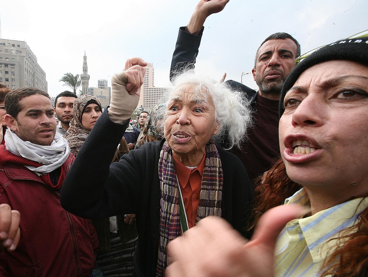 Egyptian feminist Nawal El Saadawi (centre) in February 2011 joined demonstrators in Tahrir Square in Cairo in protests that led to the overthrow of President Hosni Mubarak.