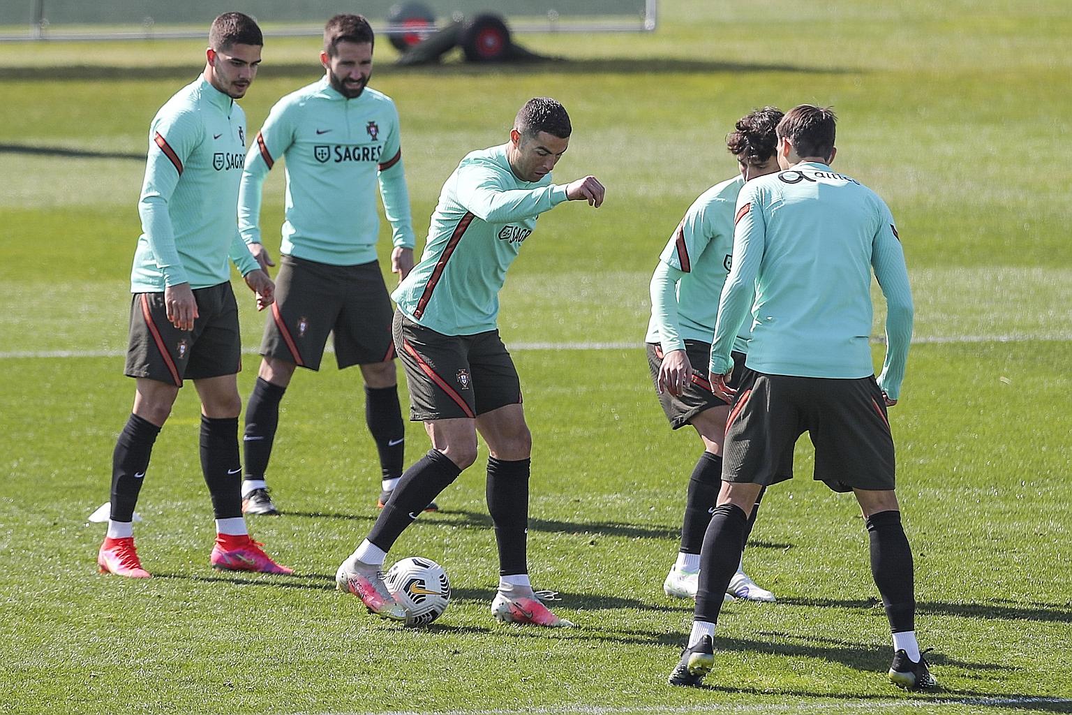 Portugal captain Cristiano Ronaldo training with his teammates yesterday in Turin, where his club Juventus are based. Portugal's home World Cup qualifying match against Azerbaijan today will take place in the Italian city due to Covid-related reasons
