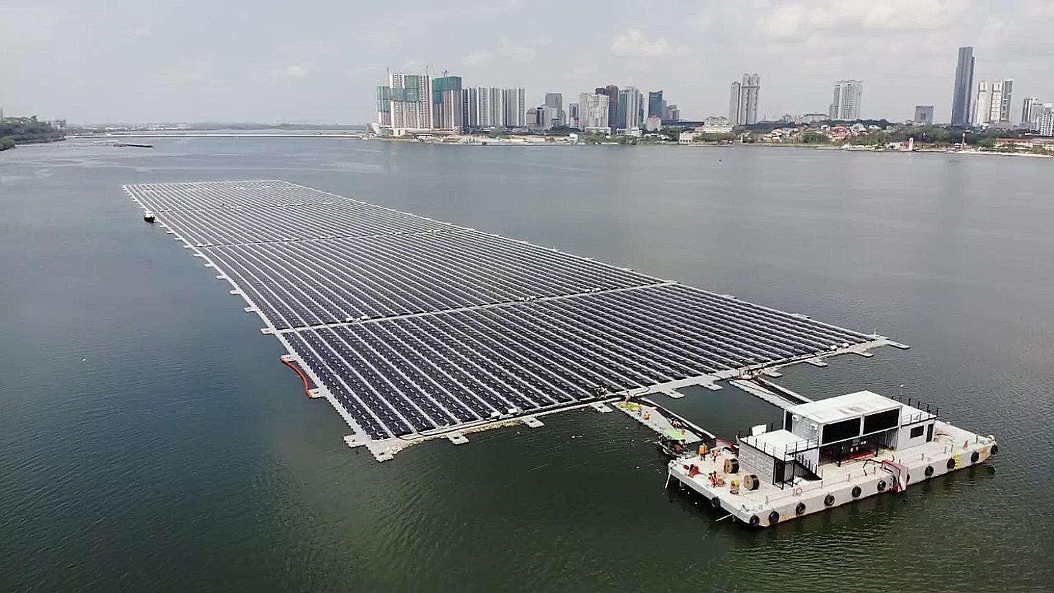 The floating solar farm in seawater in the Strait of Johor, off Woodlands, is expected to produce an estimated 6 million kilowatt hours of energy per year. PHOTO: SUNSEAP GROUP