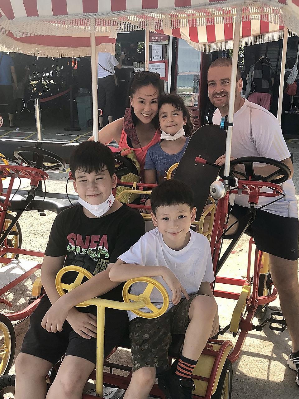 Lynn Yeow de Vito with husband Beppe de Vito and sons Lucio (at the back), Tanin (front, left) and Nico (front, right).