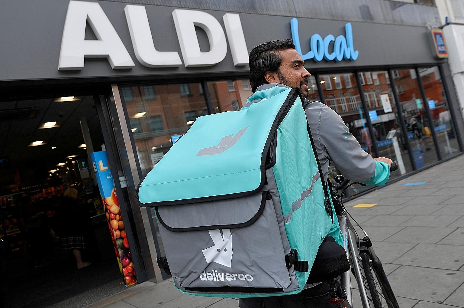 Deliveroo, whose 50,000 self-employed riders are a common sight in many British suburbs, is set for Britain's biggest stock market debut in nearly a decade. PHOTO: REUTERS