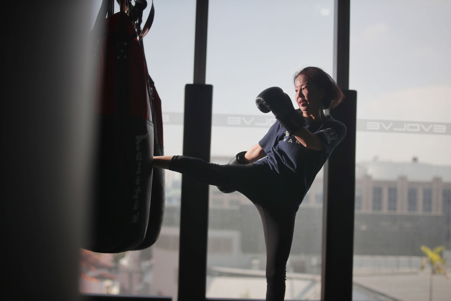 Ms Karen Chew picked up muay thai for self-defence and it has built up her confidence and strength in all aspects of life.