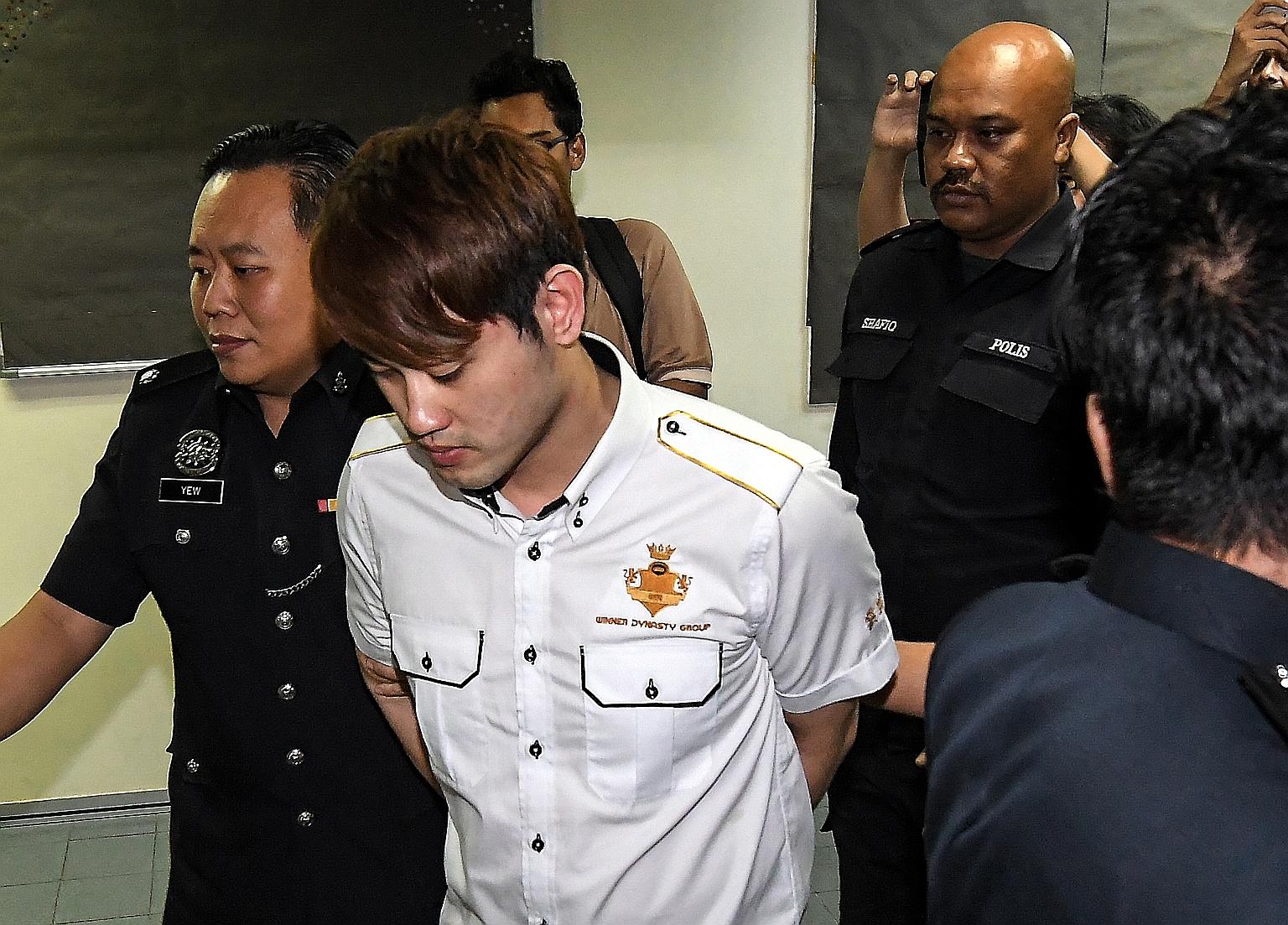 File photo of Liow Soon Hee being arraigned at a Kuala Lumpur court in 2017 on charges in connection with beating Malaysian Volunteer Department members while working at a temple in Kampung Baru Ampang. PHOTO: BERNAMA