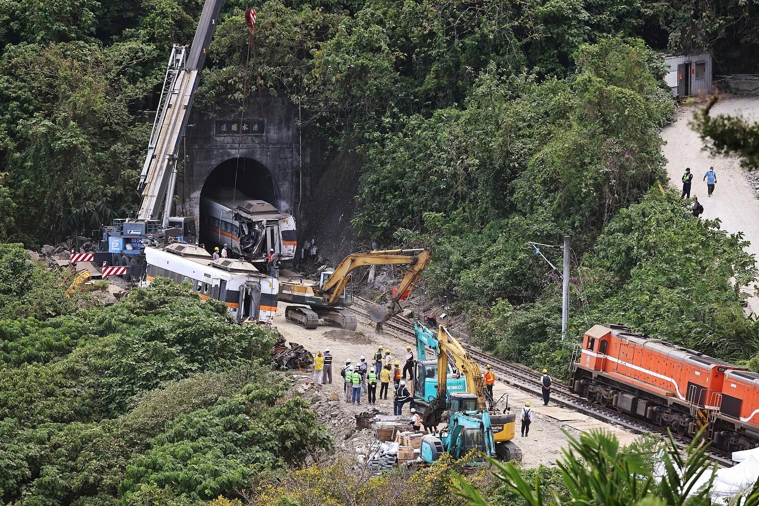 The train was sliced in half when it crashed headlong into the tunnel wall last Friday.