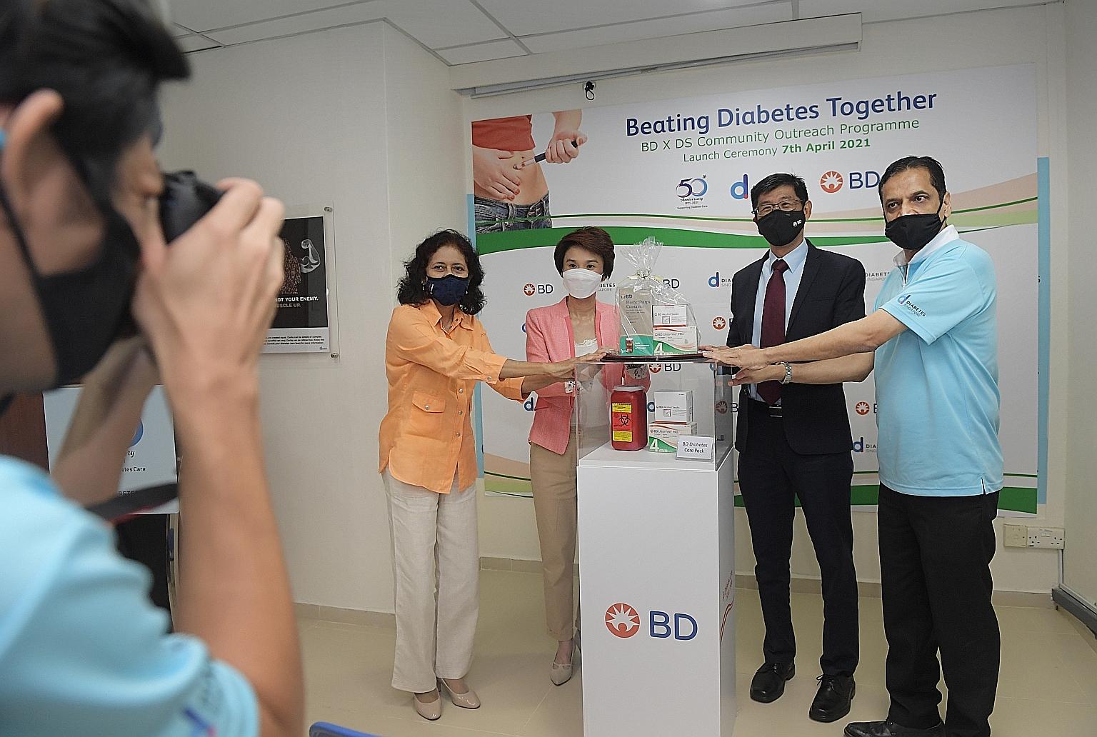 At yesterday's launch of the Community Outreach Programme were (from left): Dr Kalpana Bhaskaran, president of Diabetes Singapore; Mayor Low Yen Ling; Becton, Dickinson and Company's executive vice-president and president of Greater Asia James Lim; a