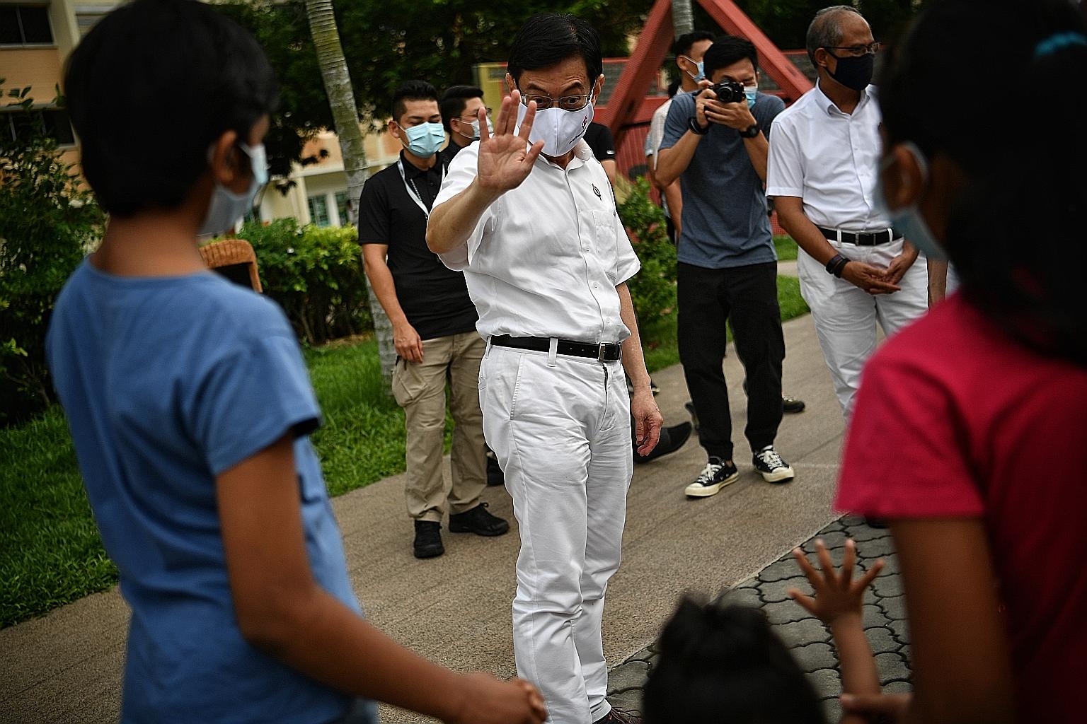 Deputy Prime Minister Heng Swee Keat on the campaign trail last July. His move to East Coast GRC to helm the PAP's team there was a surprise that took place on Nomination Day. "It was completely new ground for me and I did my best... When I went out 