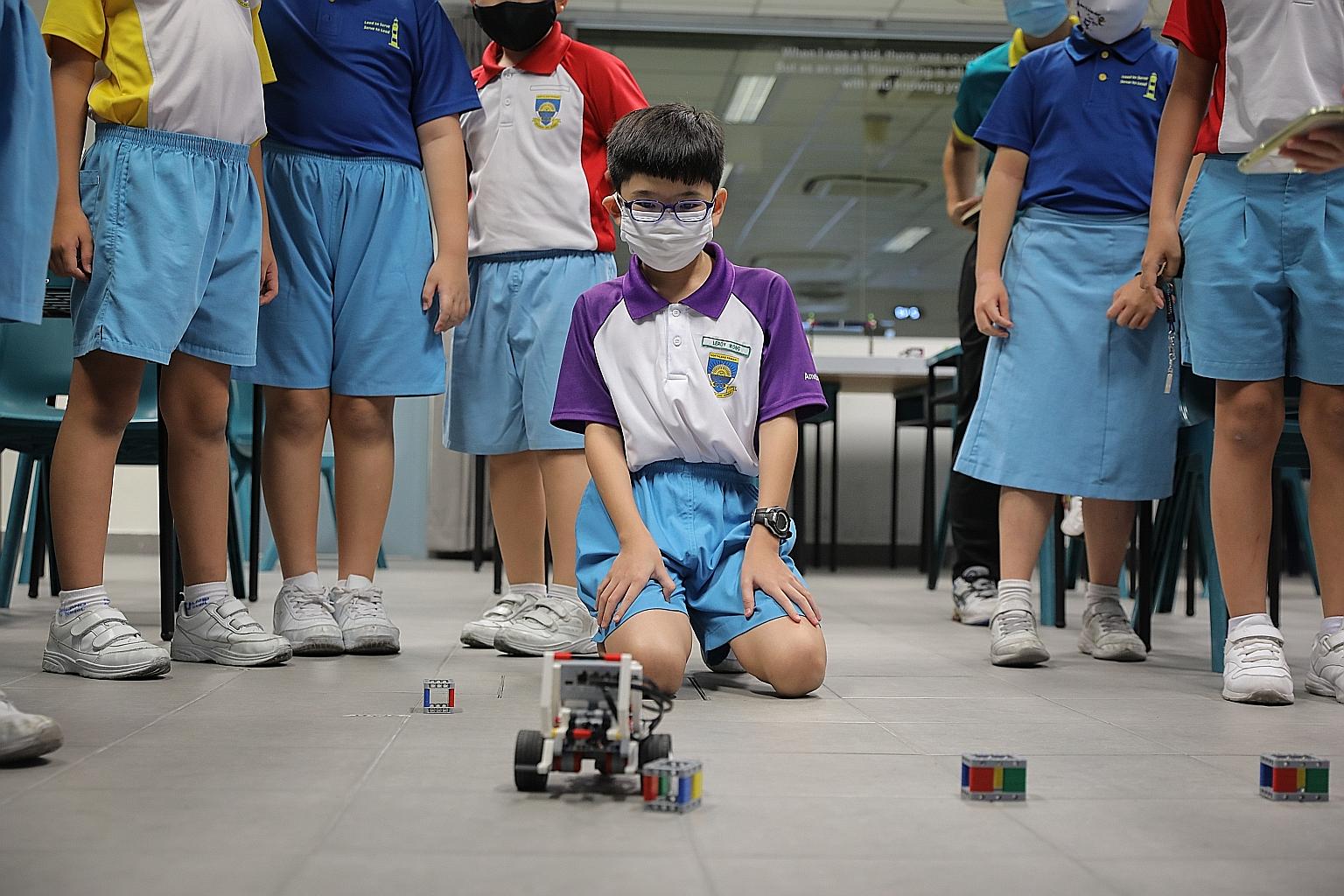 Northland Primary pupil Leroy Wong at a robotics CCA session. The school has resumed face-to-face sessions for all CCAs.