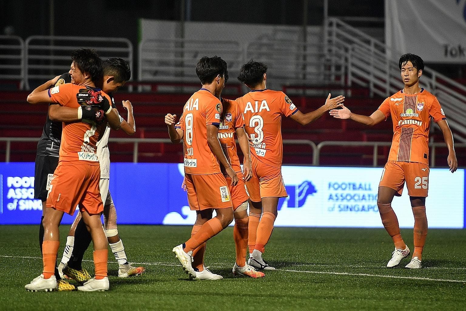 Albirex Niigata players celebrating their 2-1 win over visiting Tampines Rovers after the final whistle at the Jurong East Stadium last night.