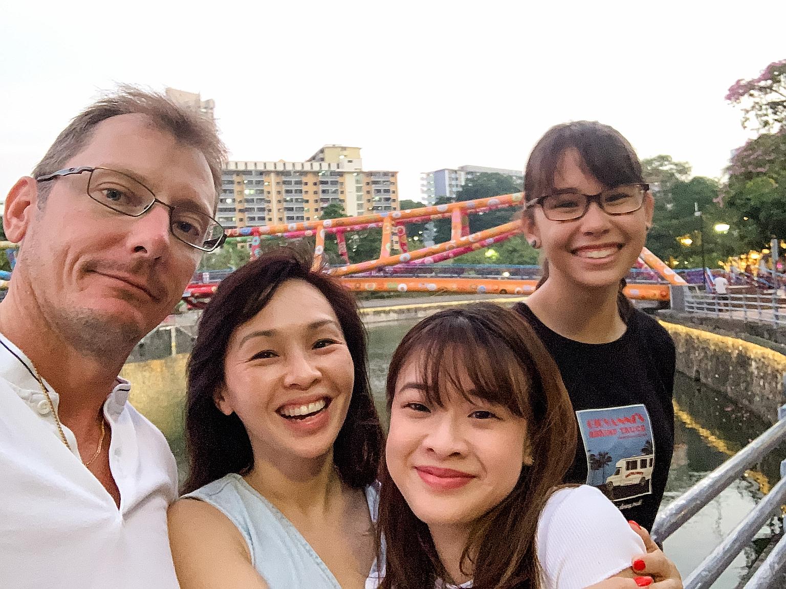 Kiss92 FM presenter Maddy Barber with her husband Wez Barber and their daughters, Elizabeth (foreground) and Alicia.