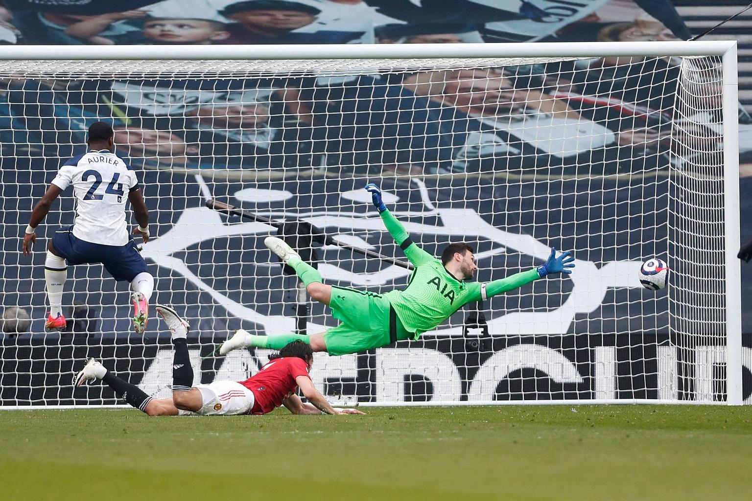 Manchester United striker Edinson Cavani scores a header during their 3-1 away win over Tottenham Hotspur on Sunday. PHOTO: AGENCE FRANCE-PRESSE