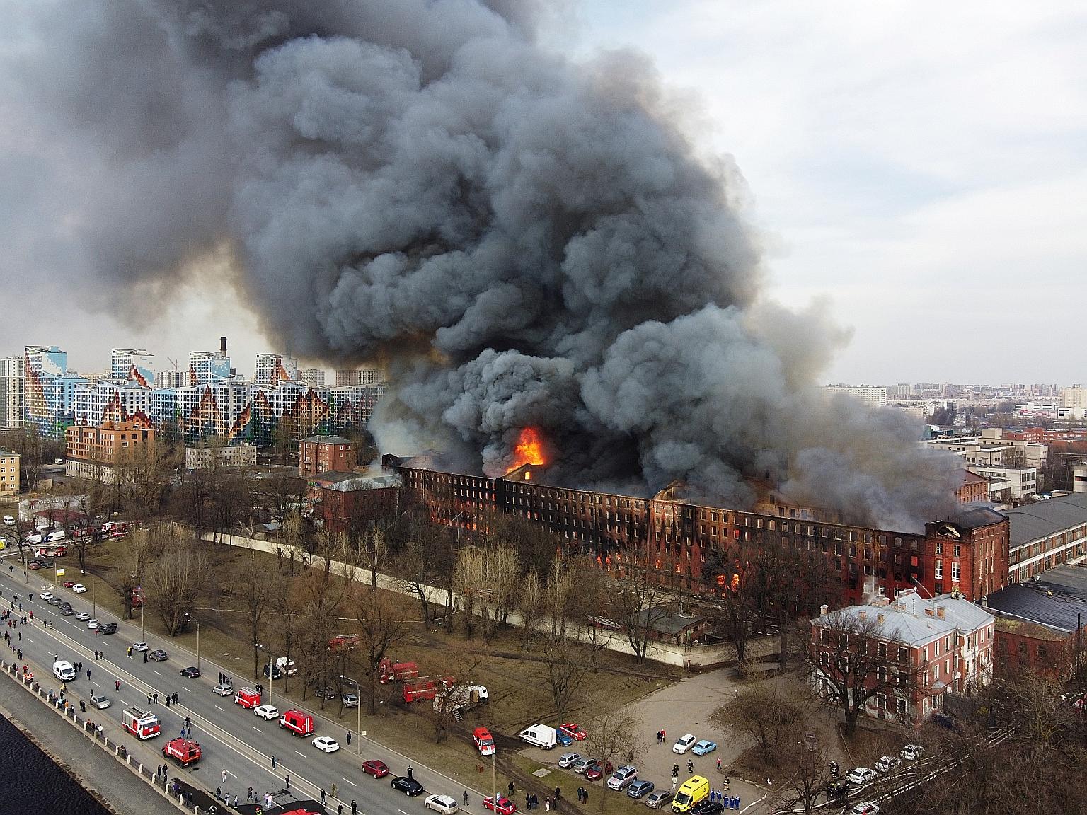 Flames and smoke rising from the Nevskaya Manufaktura factory in St Petersburg, Russia, on Monday. The huge fire destroyed the cultural heritage site. PHOTO: REUTERS