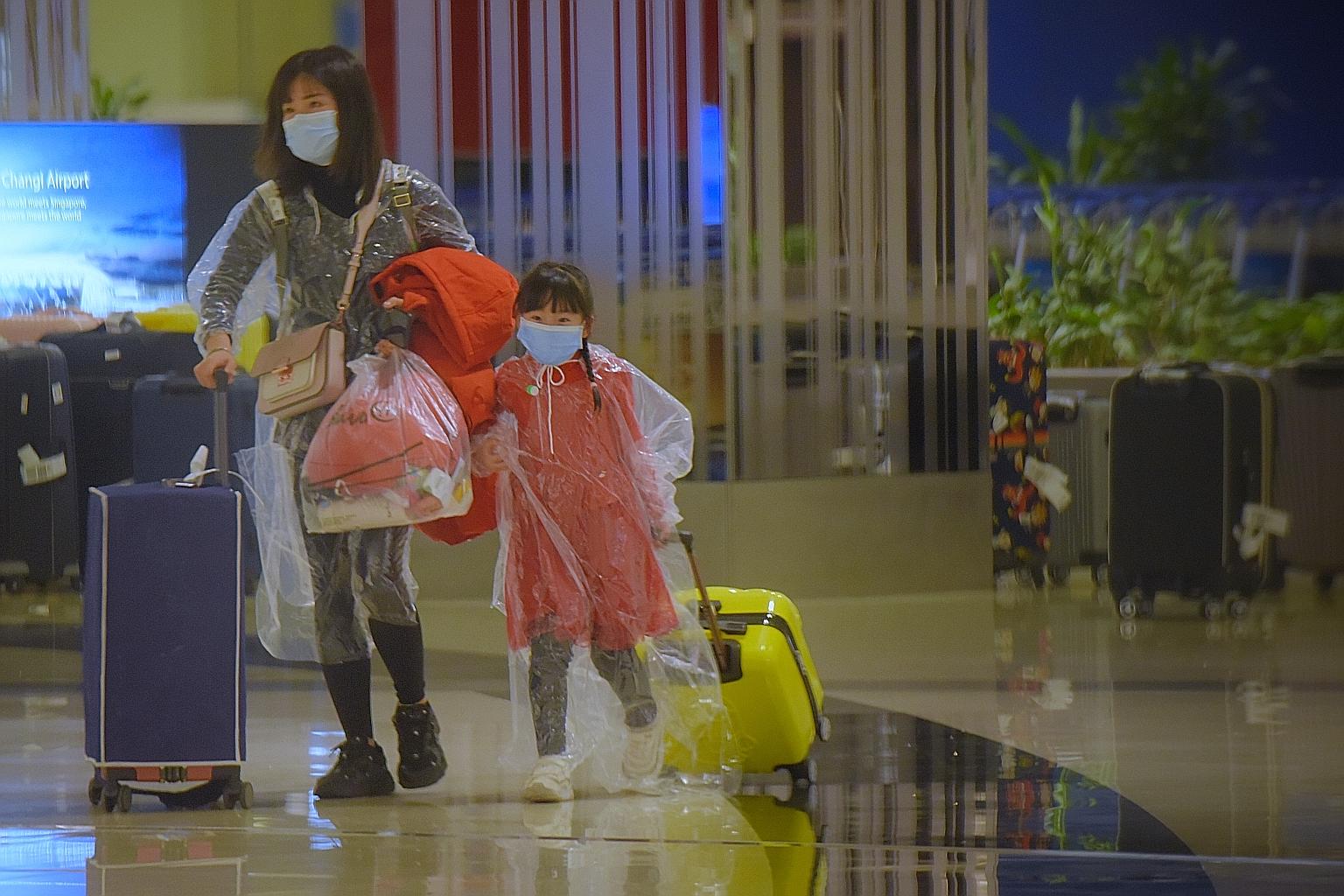 Visitors from China at Changi Airport in February. Some 70 per cent of the total number of travellers who entered Singapore under the air travel pass (ATP) scheme were from China.