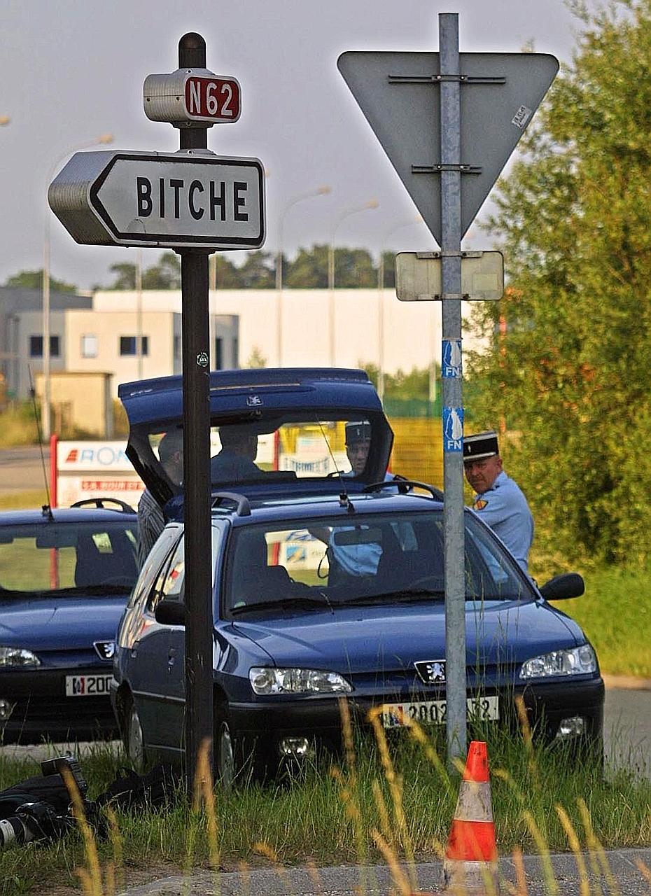 A signpost for the French town of Bitche, near the border with Germany, in 2002. Bitche means "table" in old German.